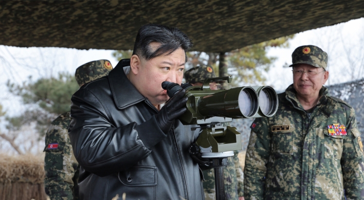 NK leader guides artillery firing drills involving border units capable of striking 'enemy's capital'