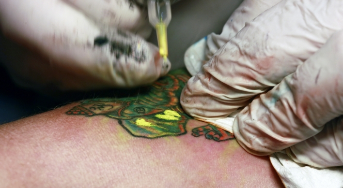 Tattooists call for legalization of nonmedical tattoos ahead of jury trial