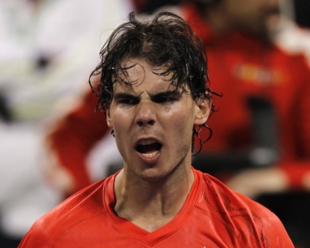 Nadal, Federer through in Qatar Open