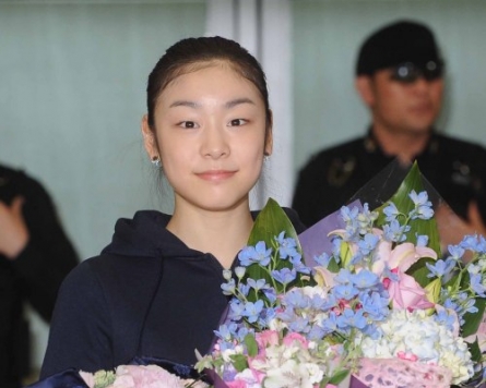 Kim Yu-na returns home