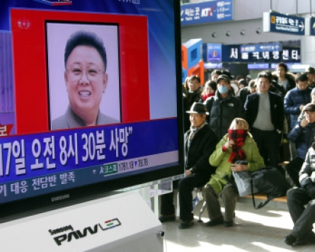 S. Koreans stunned by news of Kim Jong-il's abrupt death