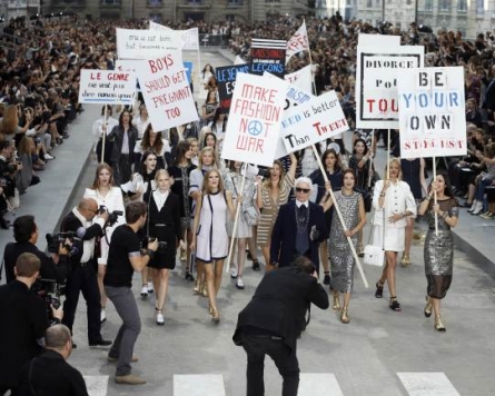 Chanel creates Paris street in star-filled show