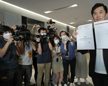 Hong Kong 'patriot' committee removes opposition lawmaker from office