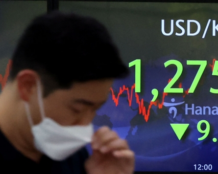 Seoul shares up nearly 1% as investors buy beaten-down issues