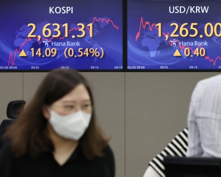 Seoul shares open higher on Fed minutes