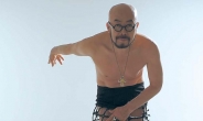 Fashion designer Lie Sang Bong poses nude