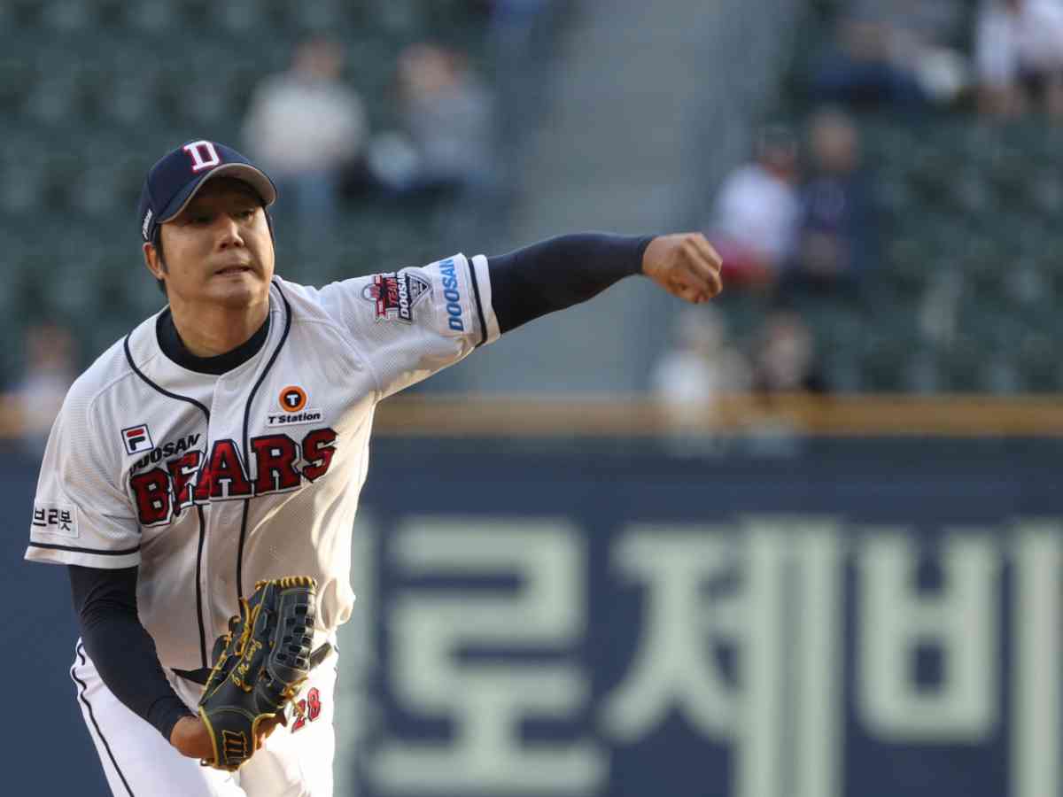 IU throws the opening pitch for the Doosan Bears