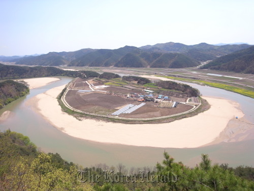 A lake twists and turns around Hoeryongpo, a village in North Gyeongsang Province