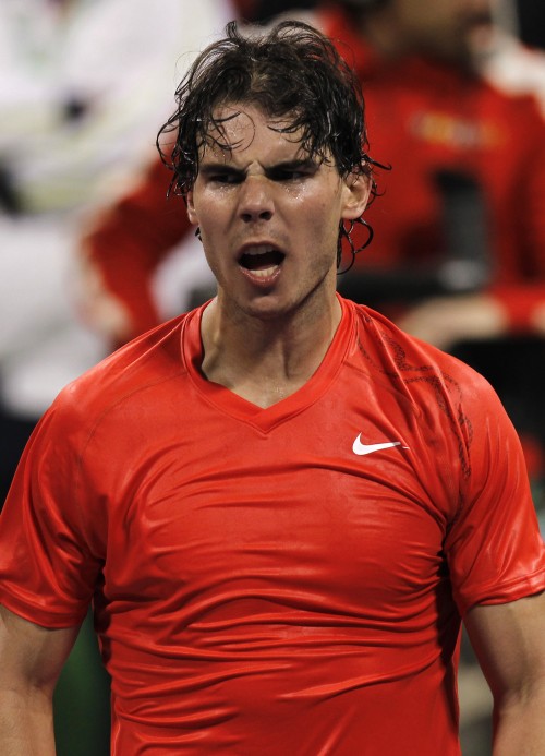 Rafael Nadal of Spain celebrates as he defeats Lacko of Slovakia during the Qatar ATP Open Tennis tournament in Doha, Qatar on Wednesday. (AP-Yonhap)News