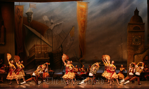 A group dance scene of the first act of “Don Quixote” (Universal Ballet Company)