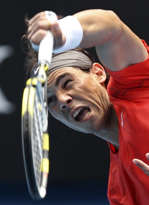 Rafael Nadal serves against Marcos Daniel at the Australian Open. (AP-Yonhap News)