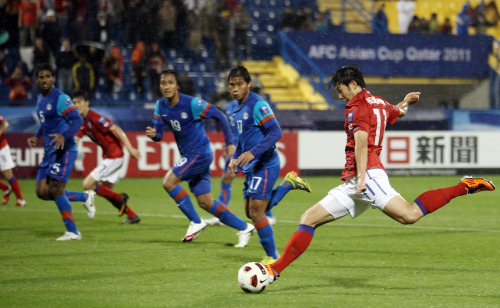 Korea’s Son Heung-min connects on a goal against India. (Yonhap News)