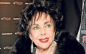 Oscar-winning actress Elizabeth Taylor remained in a Los Angeles hospital on Saturday for treatment of congestive heart failure. (AP)
