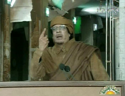 This image broadcast on Libyan state television Tuesday shows Libyan leader Moammar Gadhafi as he addresses the nation in Tripoli, Libya. (AP-Yonhap News)