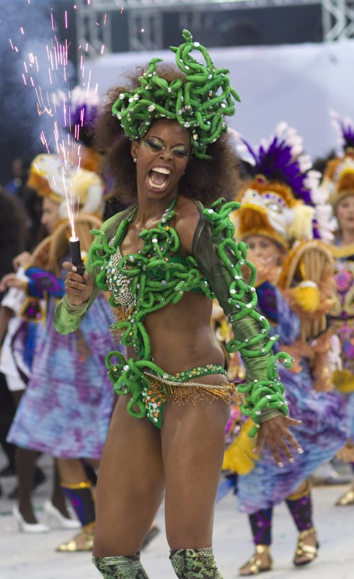 A dancer performs during the parade of the Vai Vai samba school in Sao Paulo, Brazil, Saturday, March 5, 2011. (AP-Yonhap News)