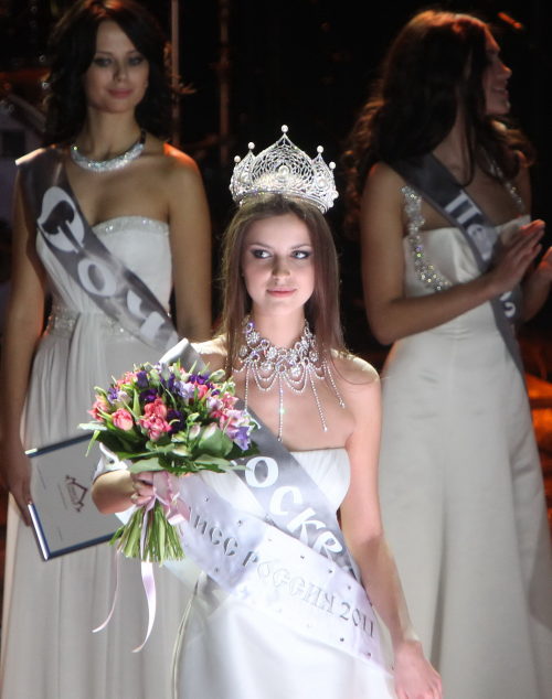 Crowned Natalia Gantimurova poses for photos during the final of Miss Russia pageant in Moscow, Russia, March 5, 2011.