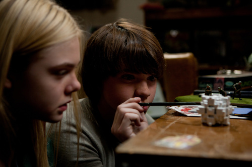 Elle Fanning, left, plays Alice Dainard and Joel Courtney plays Joe Lamb in “Super 8,” from Paramount Pictures.  (Francois Duhamel/Courtesy Paramount Pictures/MCT)