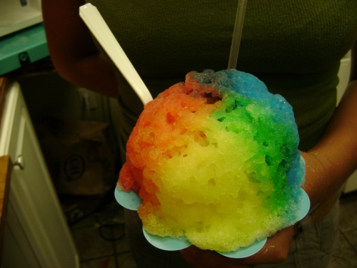 One of the near infinite flavor combinations available at Ululani’s, topped off with passion fruit, lemon, green apple and blue raspberry syrup. (Ululani’s Shave Ice)