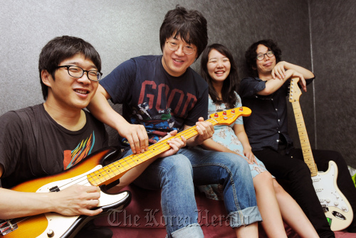 Nunco Band members, minus drummer Parang, pose for a photograph before an interview in Seoul: (From left) Mokmala on guitar, Slpny on bass, Yonrimog on keyboards and Kkamakgui on vocals. (Park Hyun-koo/The Korea Herald)