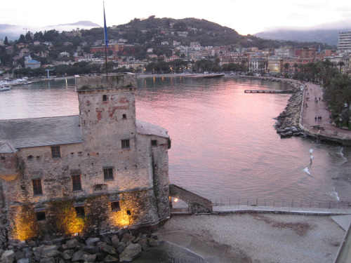 A hotel balcony offers splendid views of a 16th-century castle and a broad esplanade that hugs the shoreline of Rapallo in Italy. (MCT)