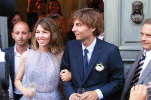 Sofia Coppola and Thomas Mars leave after their wedding ceremony in Bernalda on Saturday. (AFP-Yonhap News)