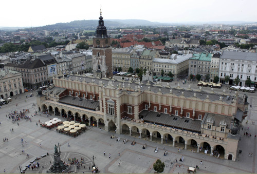 The main square of the Old Town in Krakow, Poland. With crowds of tourists and a college-town atmosphere, Krakow — once the capital of Poland — has become a European hotspot. (AP-Yonhap News)