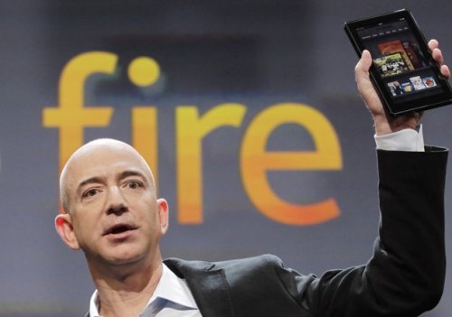 Jeff Bezos, chairman and CEO of Amazon.com, introduces the Kindle Fire at a news conference Wednesday in New York. The e-reader and tablet has a 7-inch (17.78 cm) multicolor touchscreen. (AP)