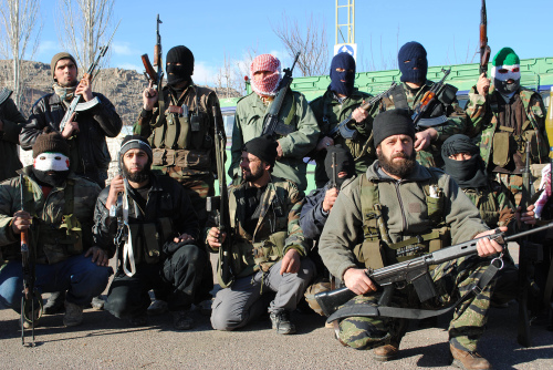 Syrian army defectors gather at the mountain resort town of Zabadani, Syria, near the Lebanese border, Jan. 20, 2012. (AP)