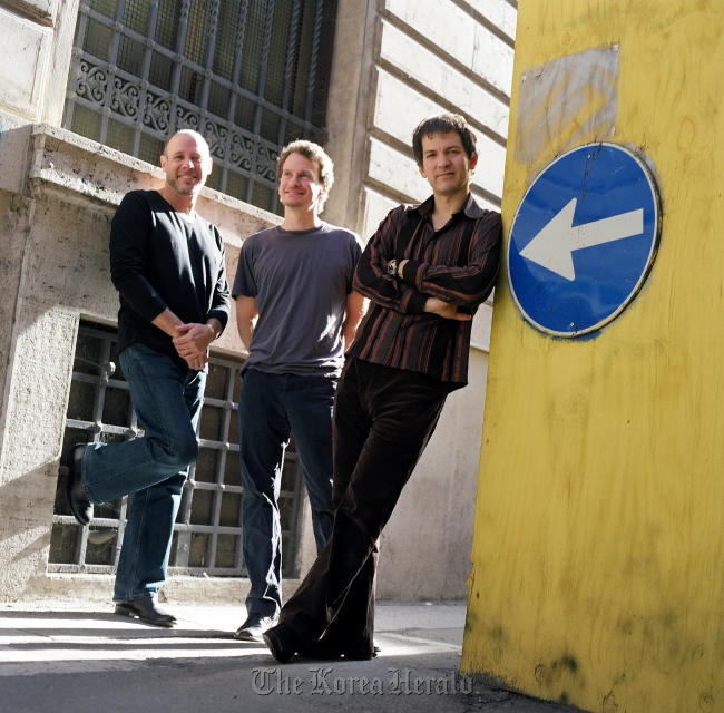 Jazz pianist Brad Mehldau (right) poses with his trio members, drummer Jeff Ballard (left) and bassist Larry Grenadier. (Private Curve)