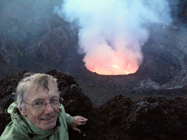 Tony Wheeler, co-founder of Lonely Planet, stands at the crater rim of the very active Nyiragongo Volcano near Goma in the Democratic Republic of Congo on June 30, 2011. (AP-Yonhap News)
