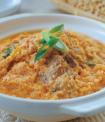 A bowl of kongbiji jjigae, a stew made with a creamy puree of soaked soybeans, is a traditional Korean dish that restaurants have often mistranslated as “bean curd dregs” or “soybean refuse.” (Korean Bapsang)