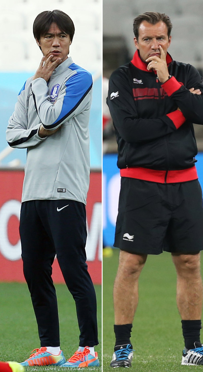 Korean coach Hong Myung-bo (left) and Belgium coach Marc Wilmots (Yonhap)
