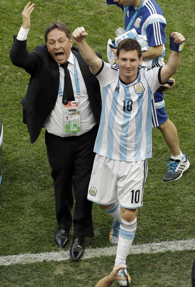 Argentina`s Lionel Messi (10) celebrates at the end of the World Cup quarterfinal soccer match between Argentina and Belgium at the Estadio Nacional in Brasilia, Brazil, Saturday. (AP)