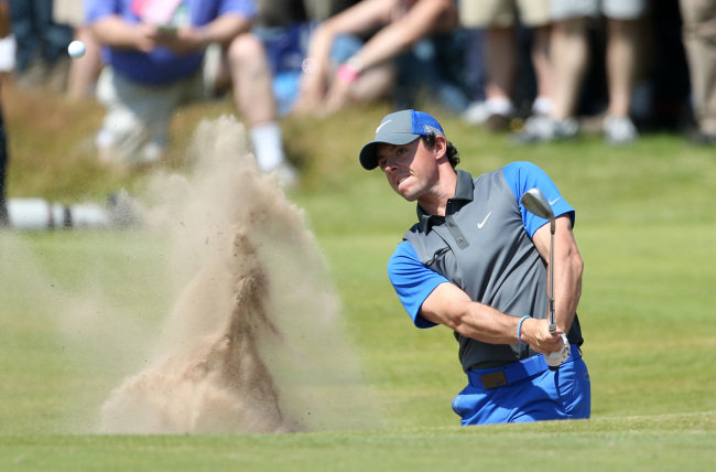 Rory McIlroy plays a shot on the 16th hole on Thursday. (AP-Yonhap)