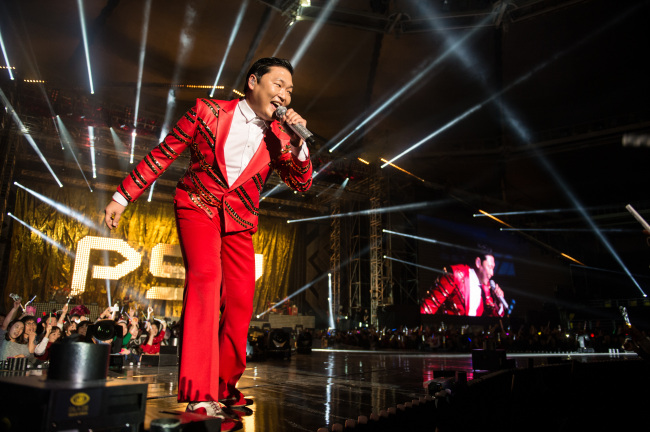Psy performs at Olympic Park’s Gymnastics Stadium last year during the K-pop star’s “All Night Stand” winter concert series. (YG Entertainment)