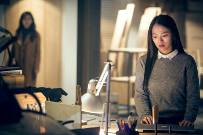 Actress Chun Woo-hee as Woo-jin, who wakes up as a different person every morning -- sometimes as a man and other times as a woman, of random age and ethnicity (Yong Film)