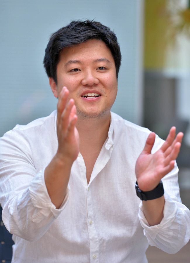 Jason Moon, CEO of WayWearable, poses at the company’s office in southern Seoul on Monday. Ahn Hoon/The Korea Herald