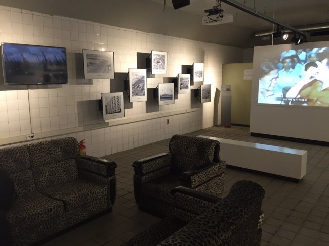 One of the bunker rooms, in Yeouido, Seoul, is arranged in its original setup in the 1970s complete with the sofa discovered at the scene. Photos and the video on the wall are displayed to show the history of the bunker. (Choi Jin-sung/The Korea Herald)