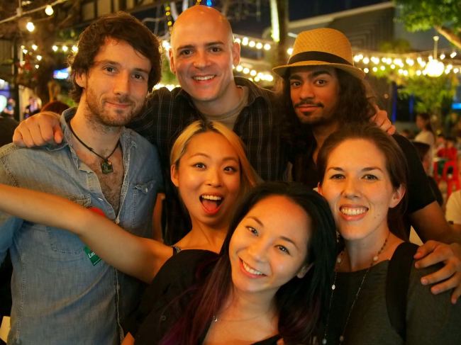 Do You-jin (center) poses with digital nomads in Thailand. (Do You-jin)