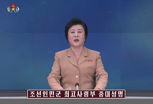 North Korean anchor delivers the North Korean regime’s warning against the upcoming joint military exercise between South Korea and the U.S., in a special broadcast on Tuesday. (Yonhap)