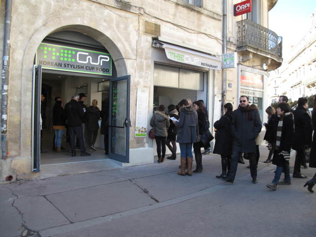 Customers queue in front of The Cup in Montpellier, France. (Yonhap)