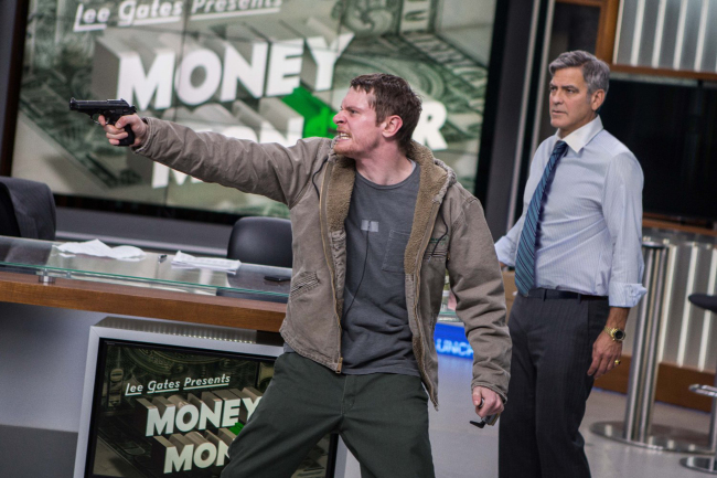 Jack O’Connell and George Clooney in “Money Monster.” (Sony Pictures/TNS)