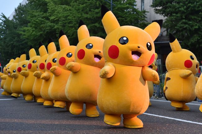 Costumed performers dressed as Pikachu, the popular animation Pokemon series character, attending a promotional event at the Yokohama Dance Parade in Yokohama in August 2015. (AFP-Yonhap)