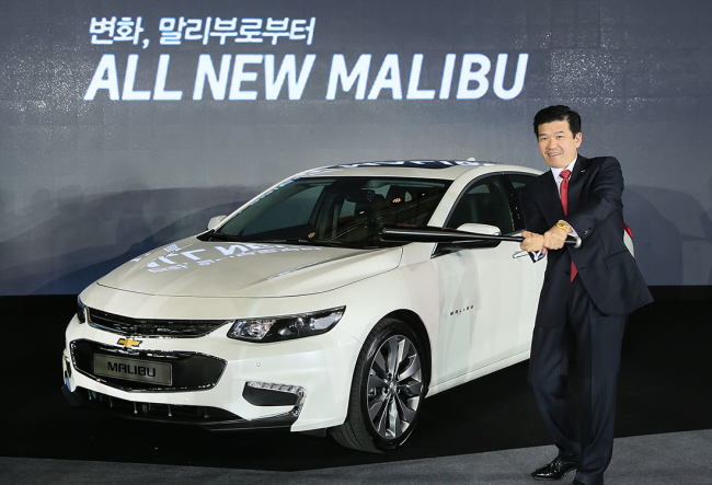 GM Korea CEO James Kim poses with the all-new Malibu. GM Korea