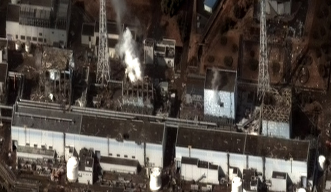 The Fukushima I Nuclear Power Plant after the 2011 Tohoku earthquake and tsunami. From left to right are reactors 1 to 4 (Digital Globe)