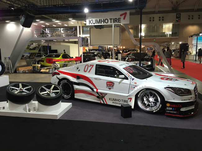 The booth of Kumho Tire at Tokyo Auto Salon 2016 displays a racing car fitted with the firm’s UHP tires and various tire solutions. Kumho Tire