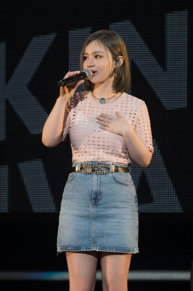 Lee Hi performs during a concert at the Sangam World Cup Stadium in Seoul on Sunday. (YG Entertainment)