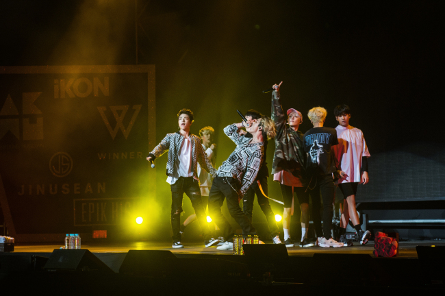 iKon performs during a concert at the Sangam World Cup Stadium in Seoul on Sunday. (YG Entertainment)