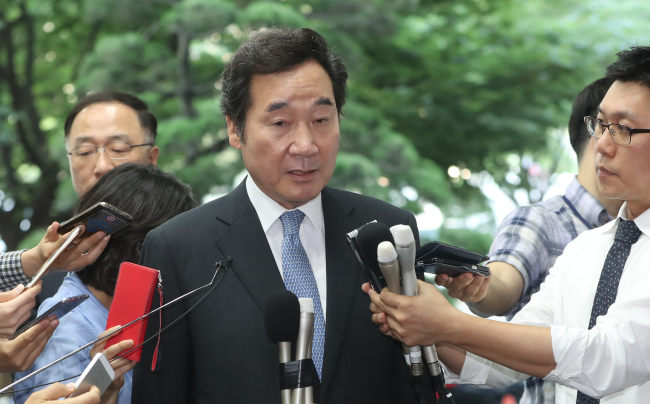 Prime Minister Lee Nak-yon meets the press after his nomination was approved by the National Assembly on Wednesday. (Yonhap)