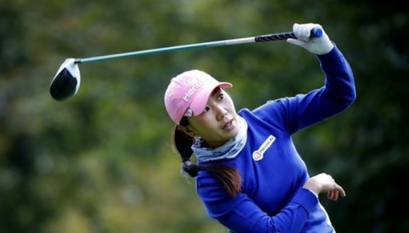 In this Associated Press photo, Kim In-kyung of South Korea watches her shot at the fourth hole during the final round of the Evian Championship on the LPGA Tour in Evian-les-Bains, France, on Sept. 17, 2017. (Yonhap)